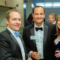 Guests posing in the Laker Lounge